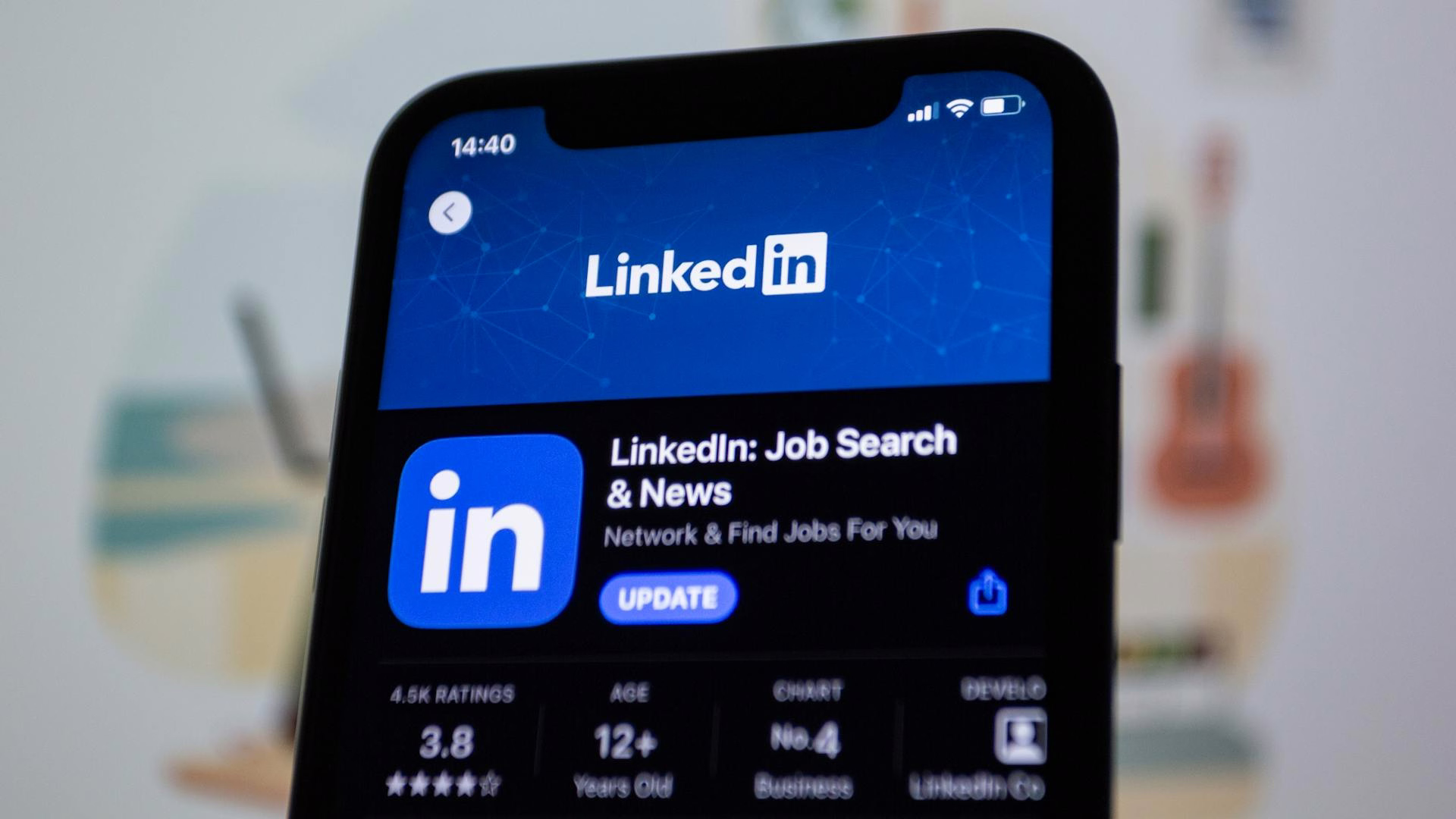 Smartphone showing the LinkedIn app listing in the App Store